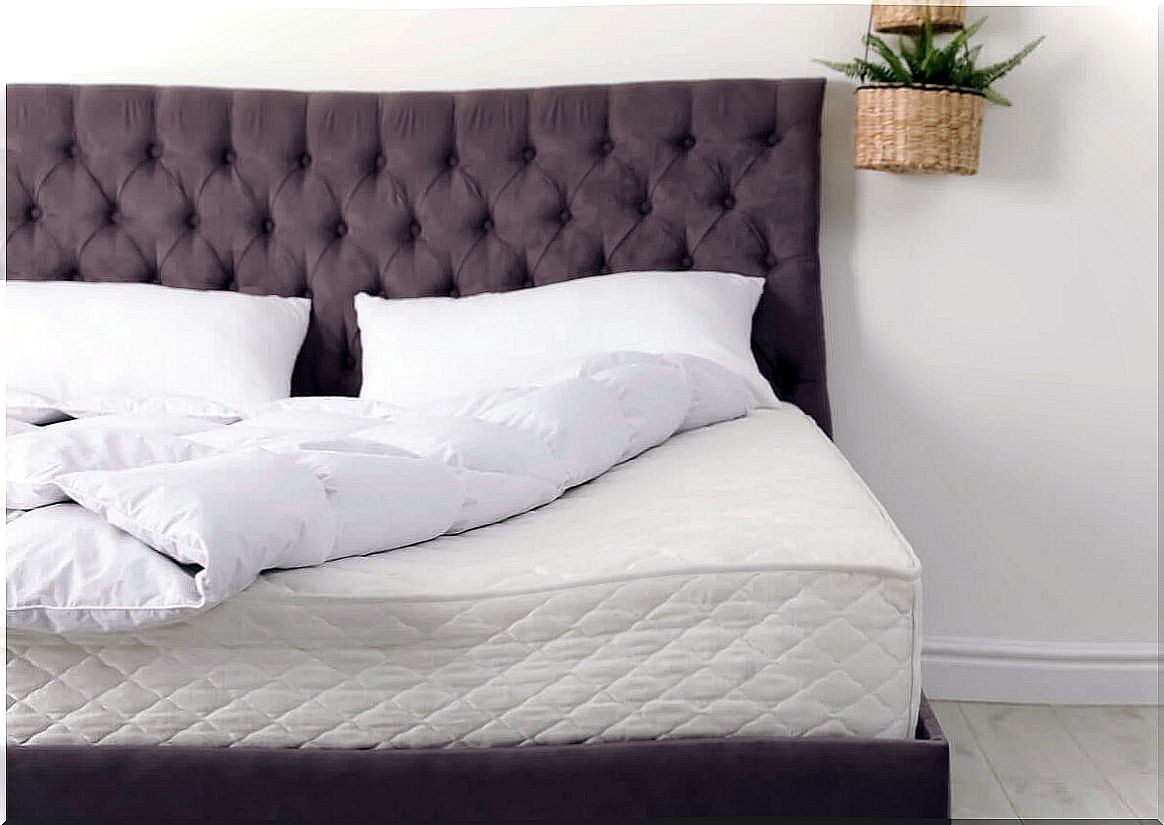 Bed with headboard