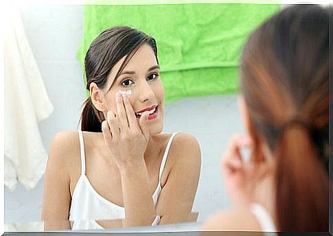 Woman using Vaseline under the eyes