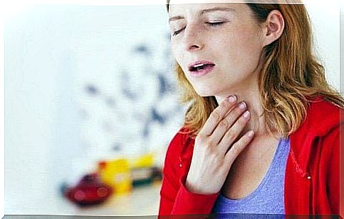 Woman taking care of the neck - Early signs of throat cancer