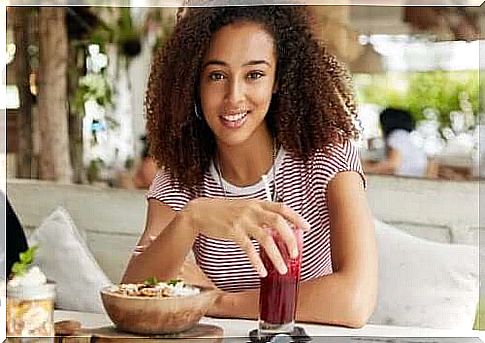 Woman eating breakfast