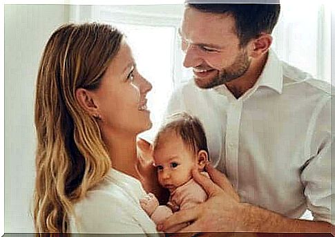 Young couple with newborn baby