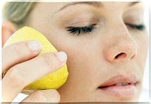 Woman applying lemon 