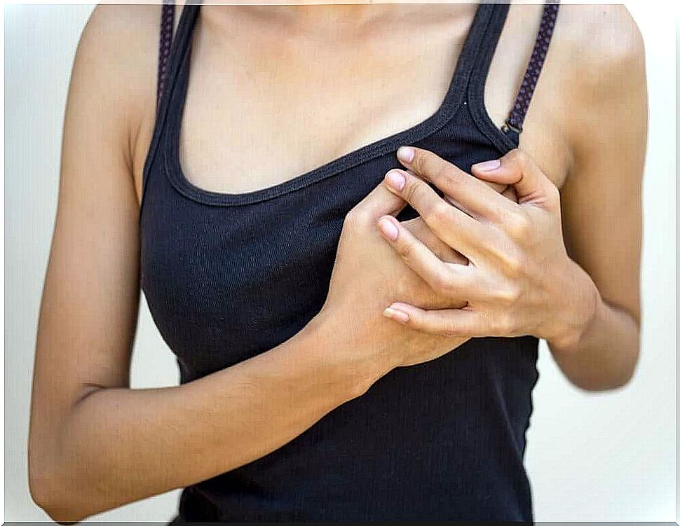A woman experiences chest pain