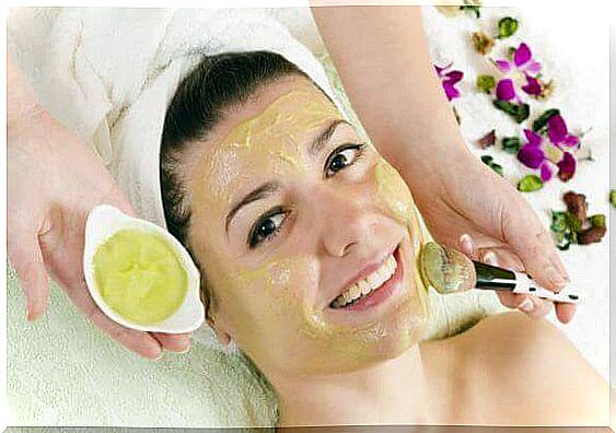 Woman getting face mask put on