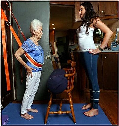 Elderly woman practicing yoga