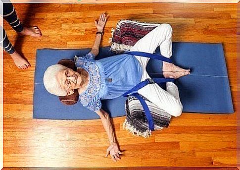 Elderly woman practicing yoga