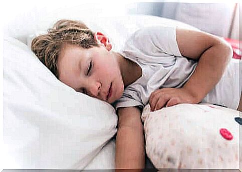 Boy with childhood asthma sleeping