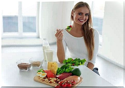 Woman eating healthy diet as part of hair loss prevention