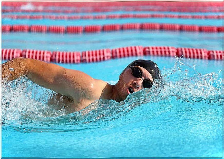 Man swimming in pool