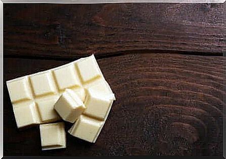 White chocolate on wooden table