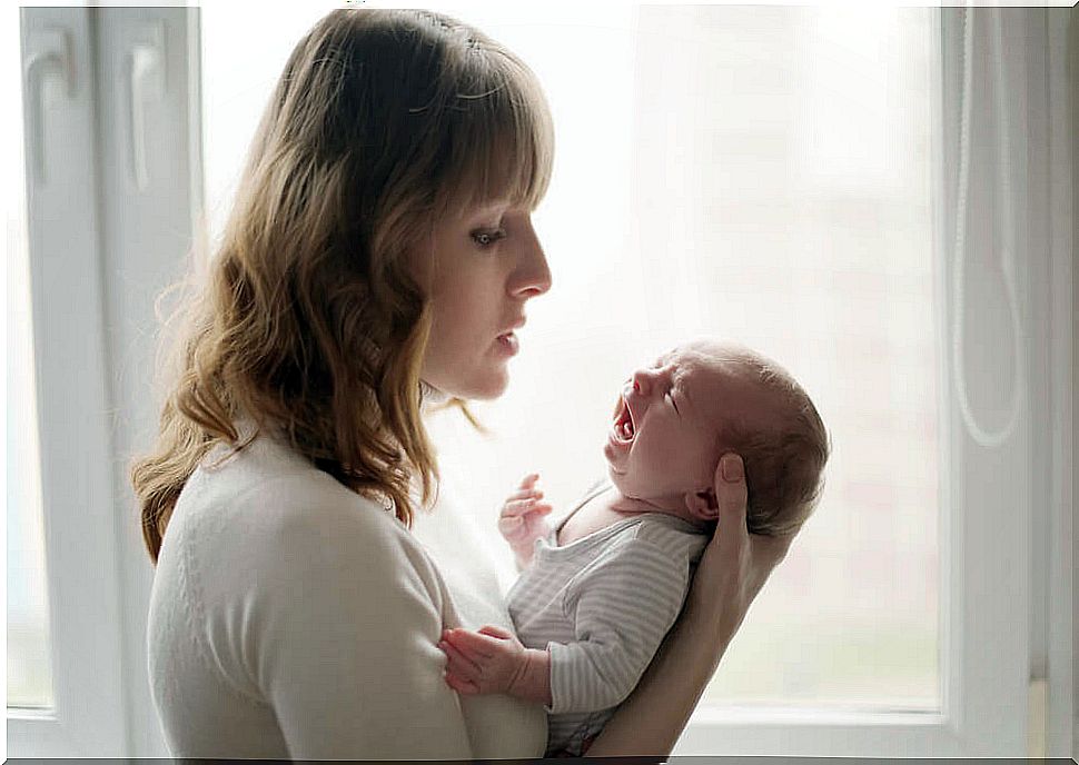 Mother with crying baby